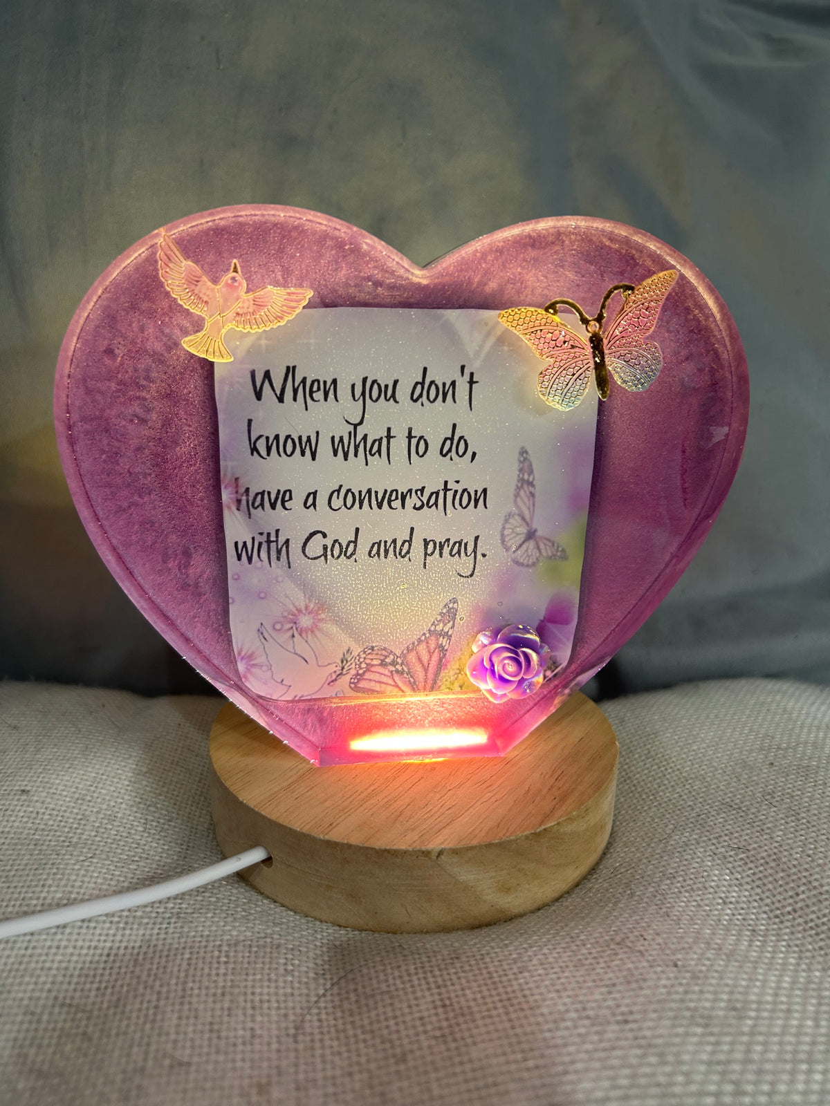 Small pink heart “When you don’t know what to do” with butterflies and roses.