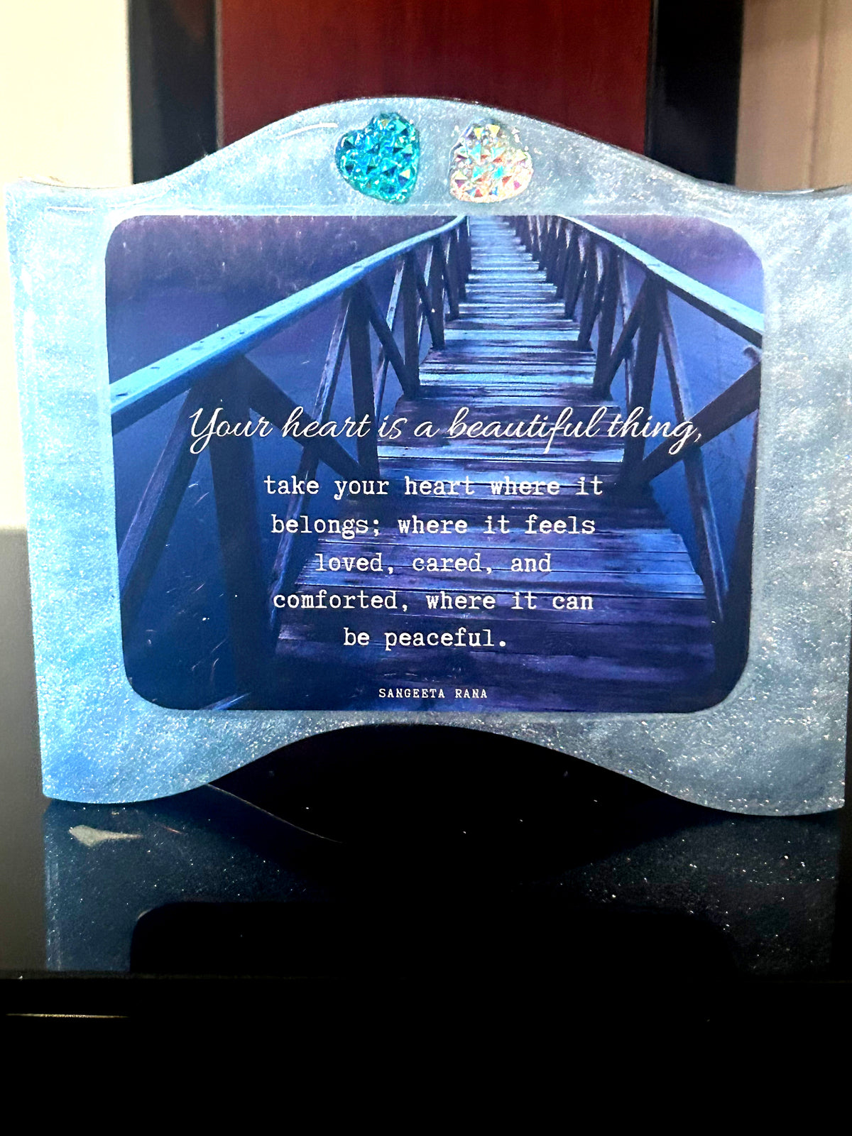 We’ve resin with quote light blue “Your heart is a beautiful thing”
